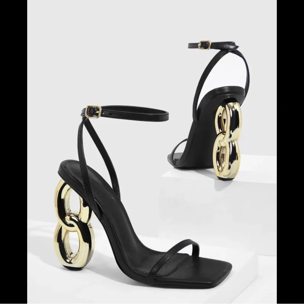 CuCio Black Ankle-Strap Sandal with Gold Statement Heel - Picture 3 of 3